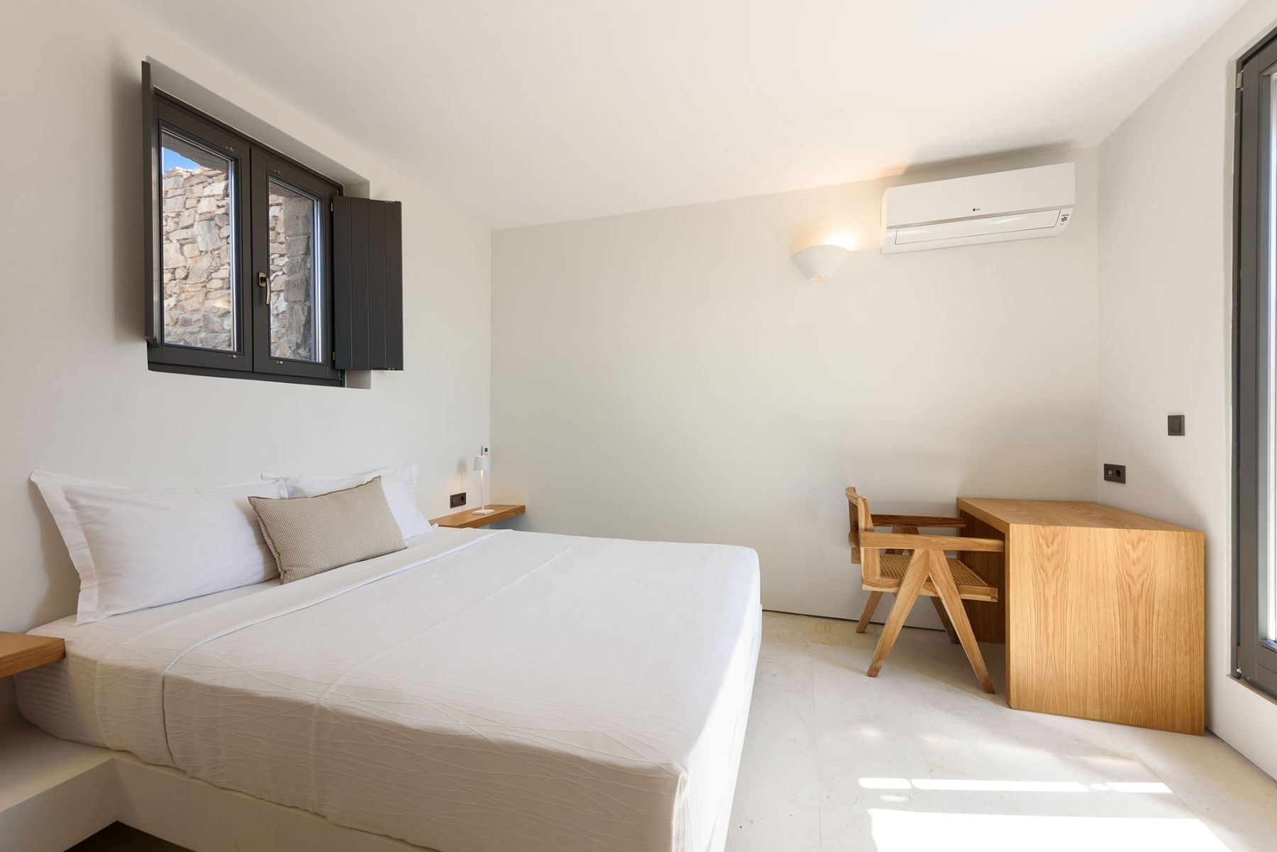 Double ensuite bedroom with office desk space. 