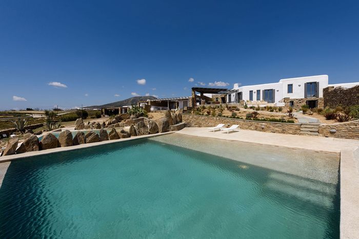 This luxury villa features wonderful modern detail and is surrounded by the glorious sea breeze.