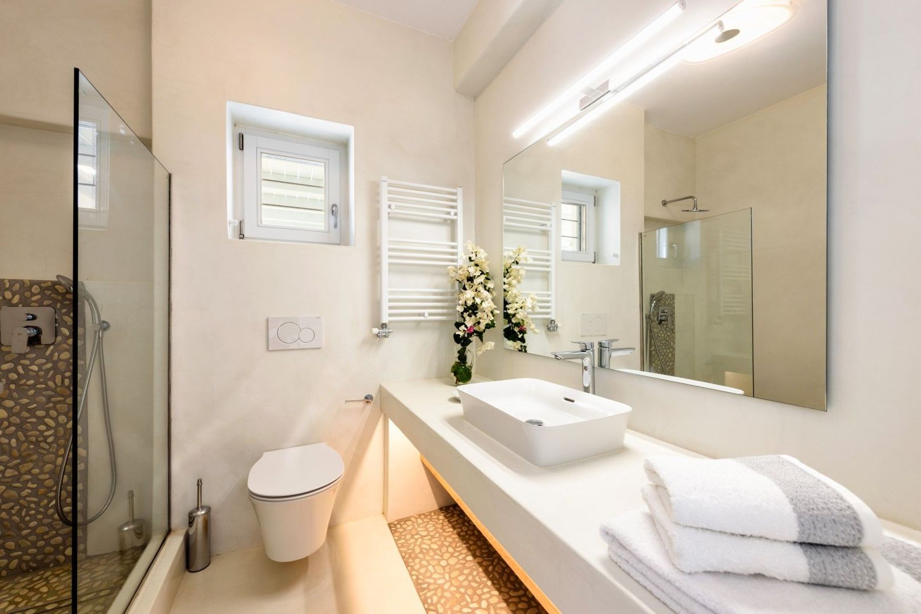 Stylish ensuite bathroom with walk-in shower.