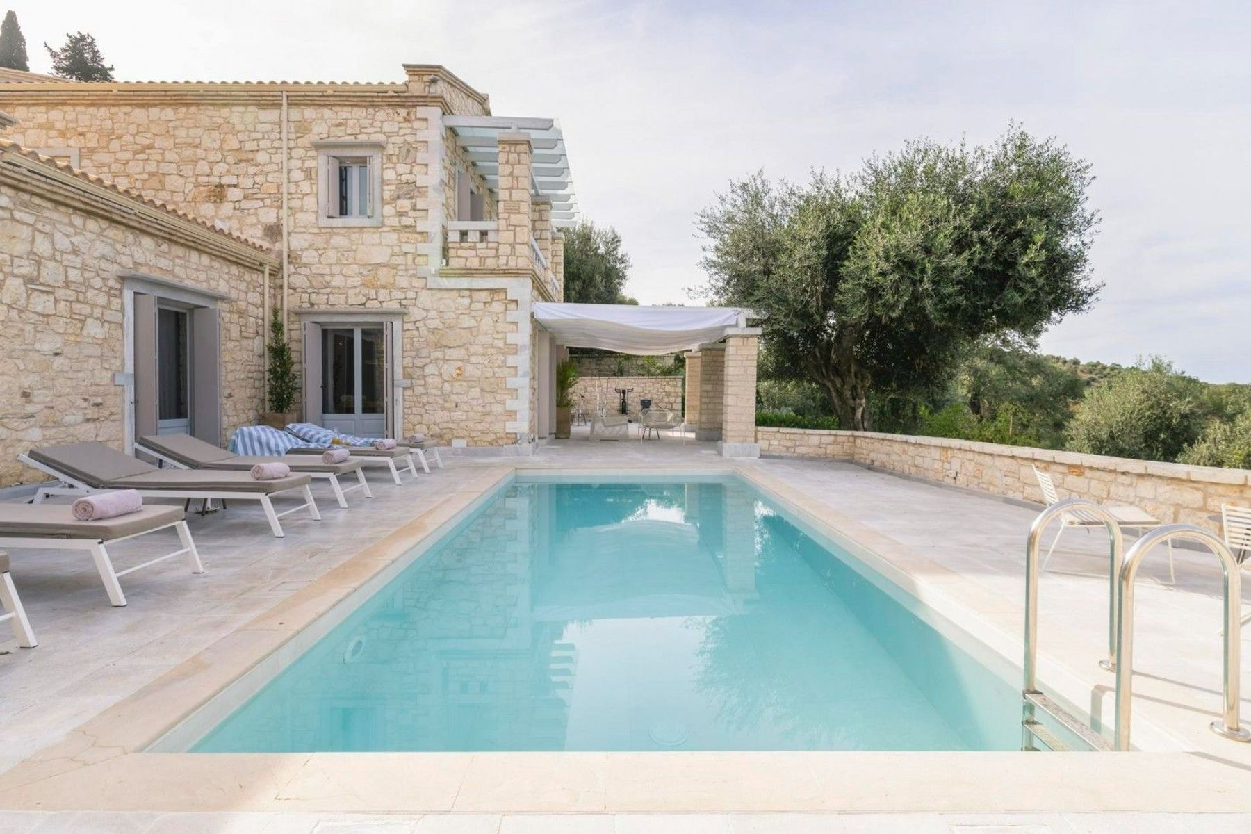 The stunning stone-built estate blends beautifully with the vast lush area around it, looking like it was always part of the scenery. 