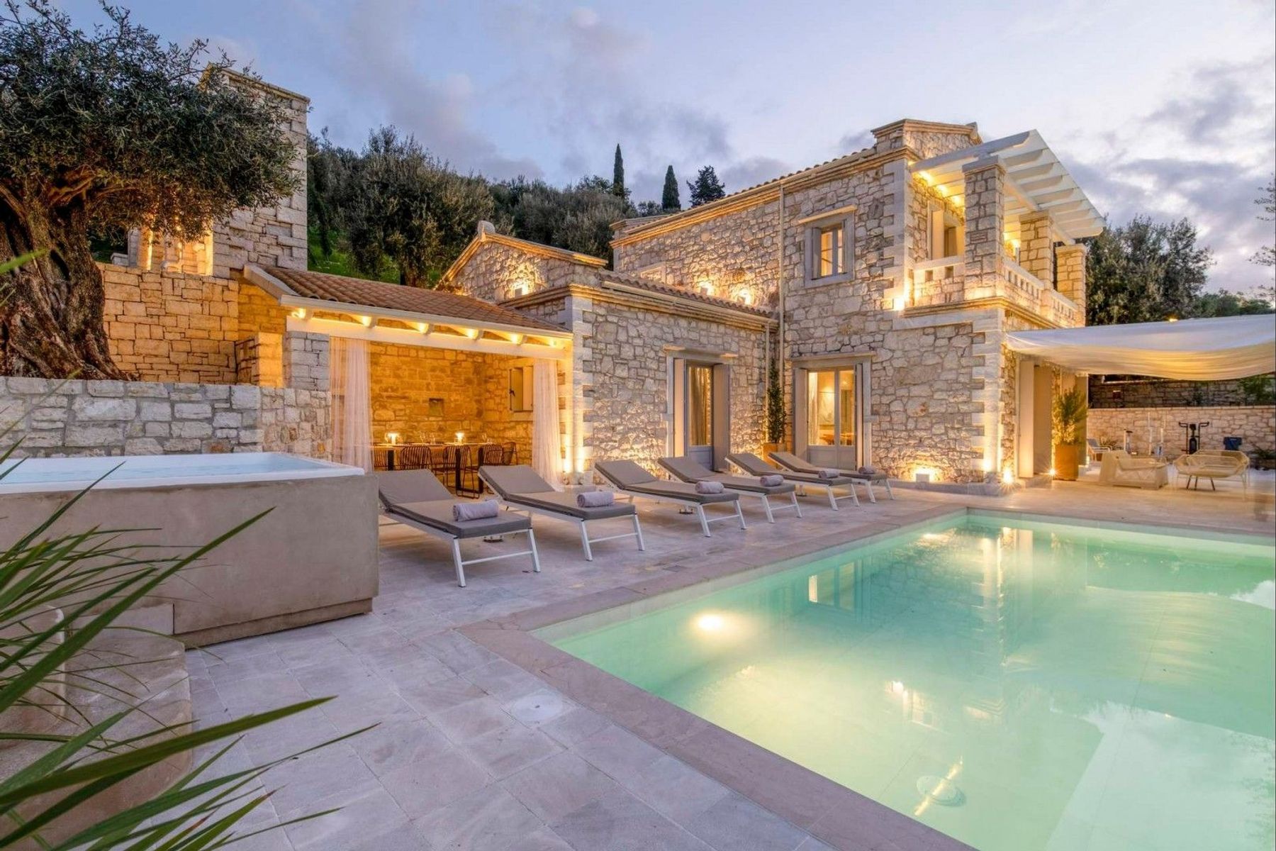 This exquisite estate is built entirely out of stone fitting perfectly with the surrounding area and promoting a stunning outdoor way of living.