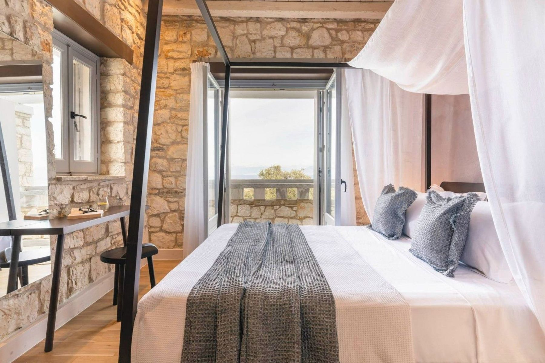 Double ensuite bedroom with opulent interiors and private balcony access.
