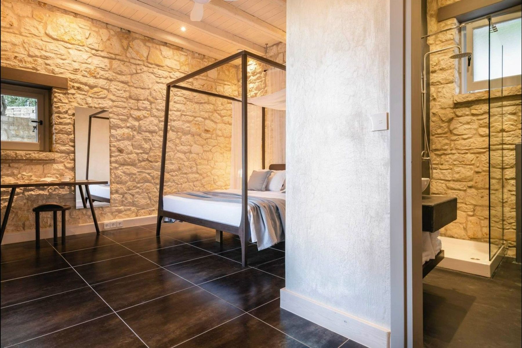Double bedroom with spa-like bathroom with shower. 