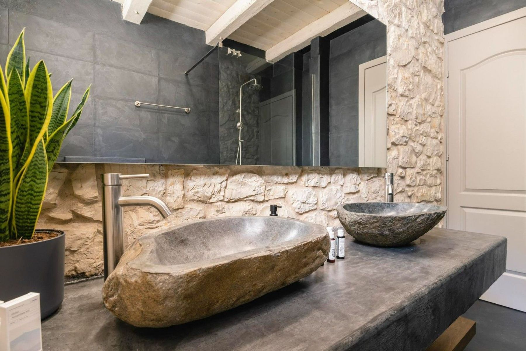 Indulge in the spa-like bathrooms with double basins and modern vanity unit. 