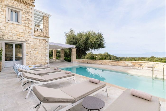 An incredible luxury estate set within a gated area in Vasilika, that offers the perfect escape for family and friends in Corfu.