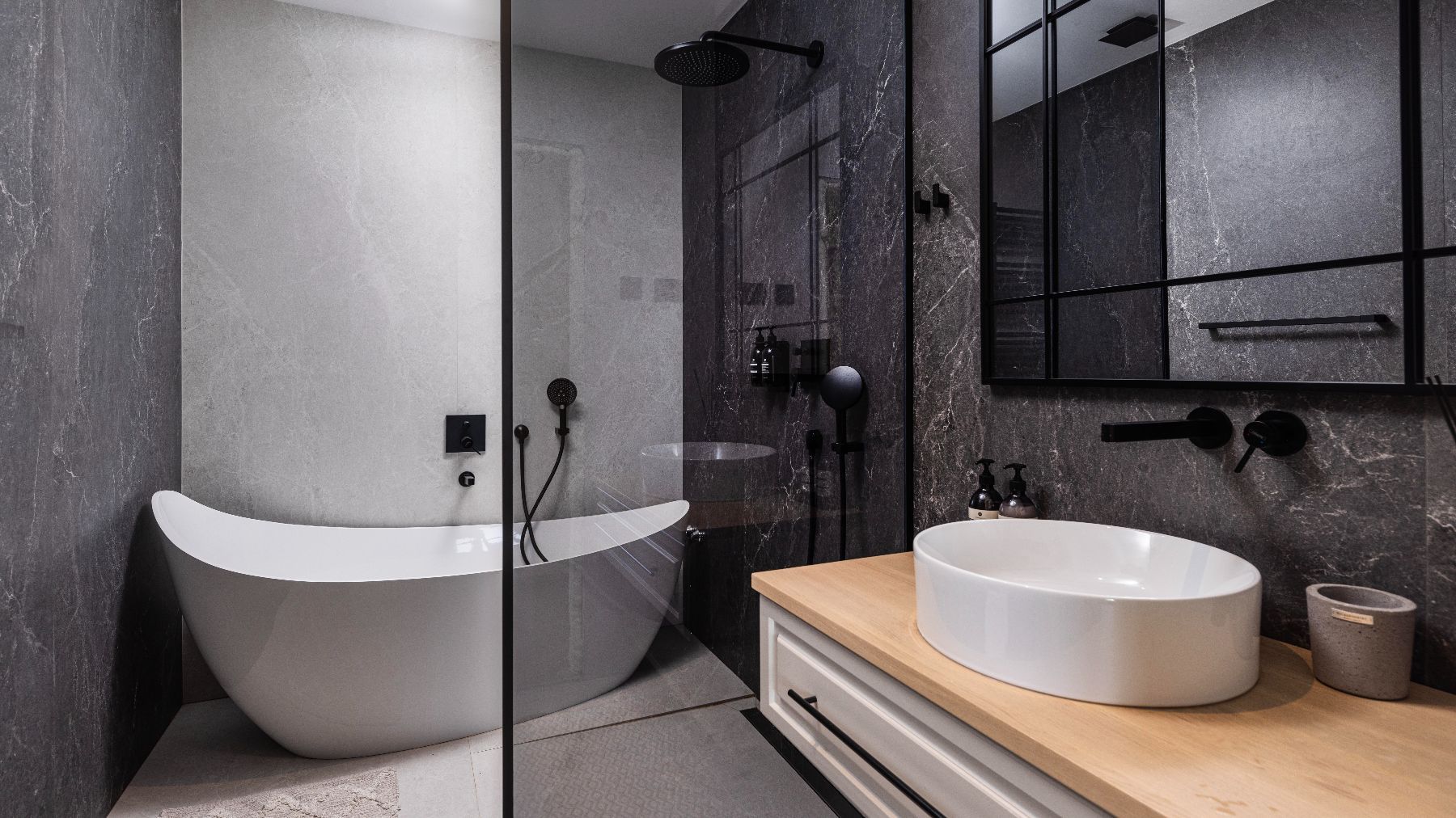 Stunning modern bathroom with shower and bath-tub.