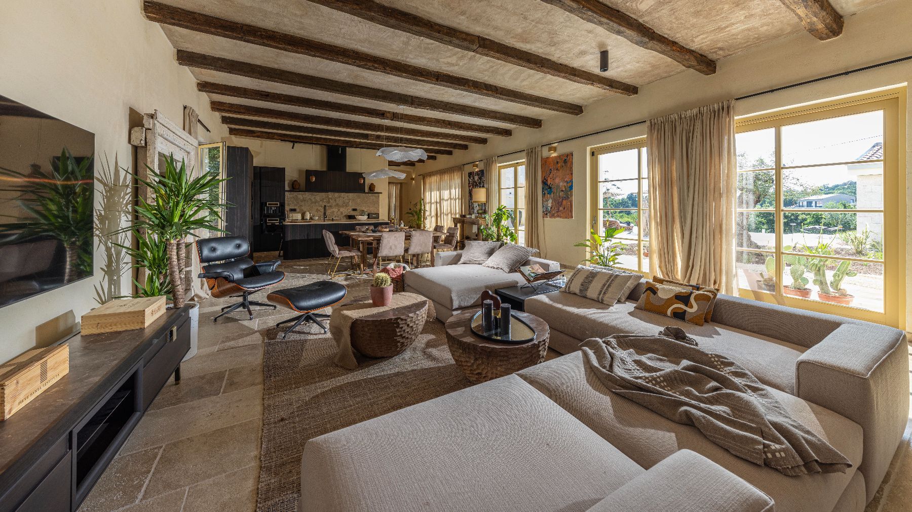 Superb open-plan living with traditional features and large windows, giving the sense of bringing the outside, in. 