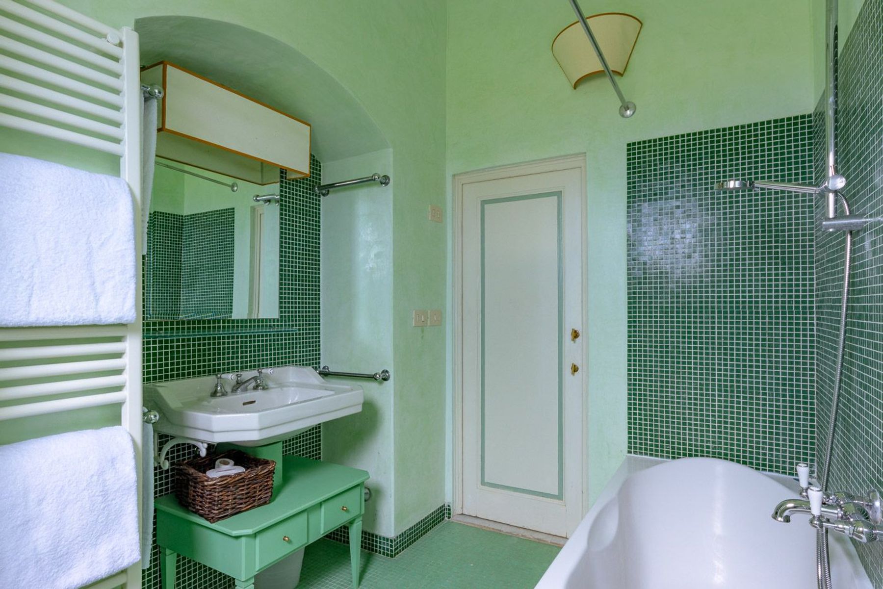 Ensuite bathroom with bath-tub and shower.