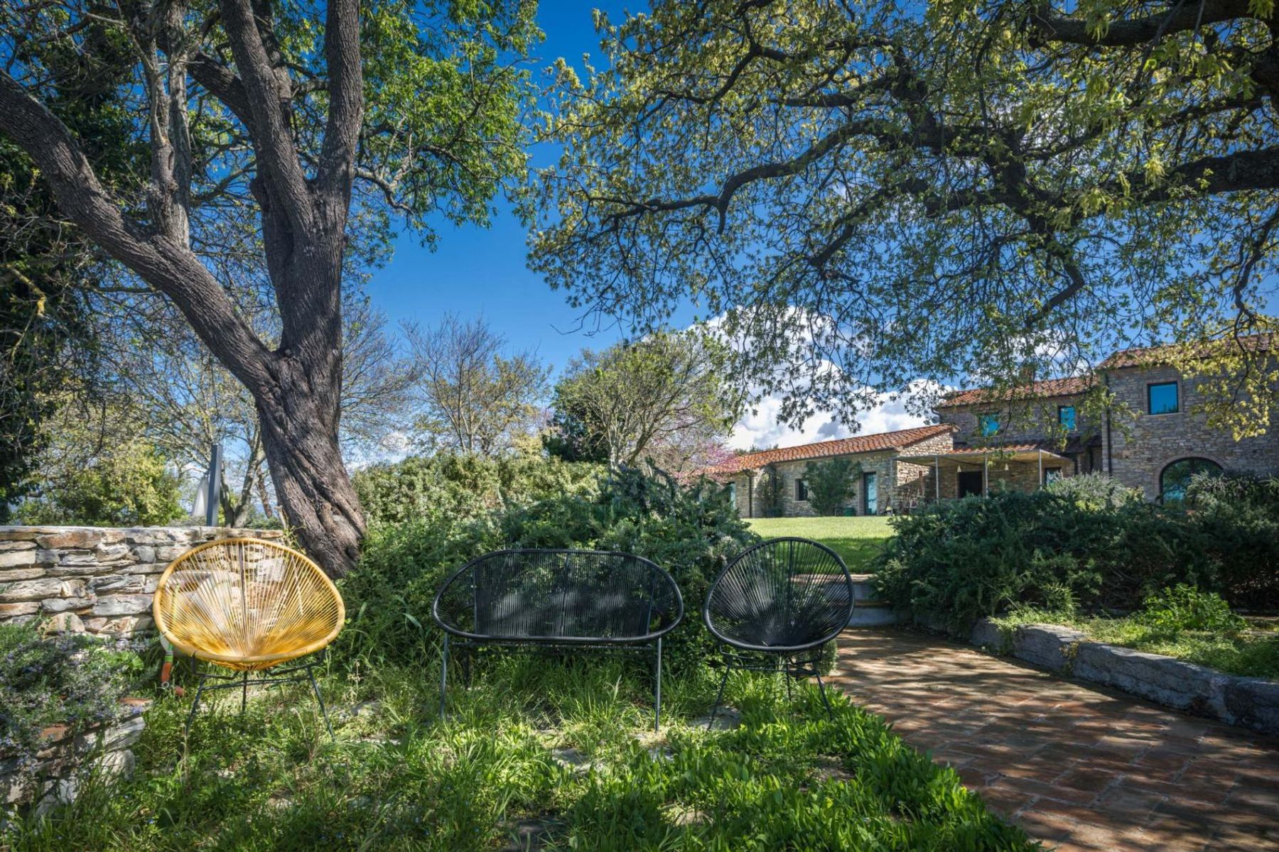 Backyard retreats feature cozy nooks and secluded reading corners that offer moments of solitude. 