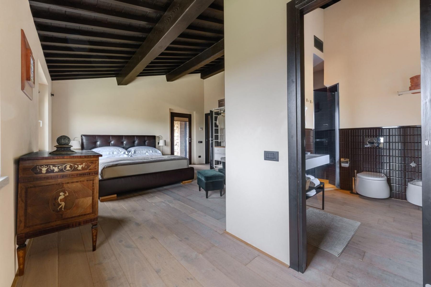 Double ensuite bedroom with air-conditioning, and smart television.