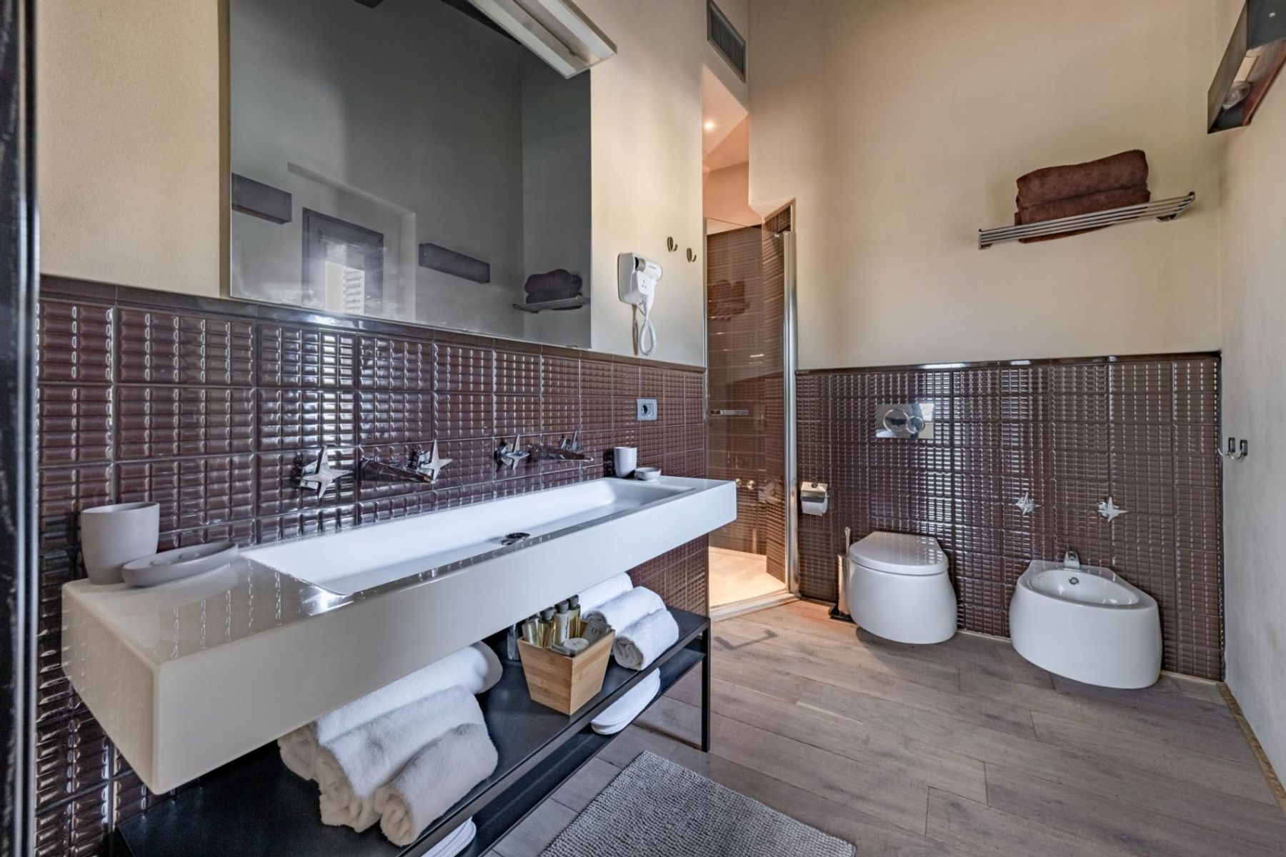 Spa-like ensuite bathroom, with walk-in shower, double basin and bidet. 