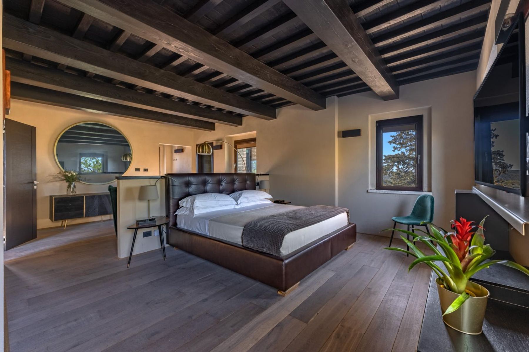 Spacious double ensuite bedroom, with air-conditioning and smart television.