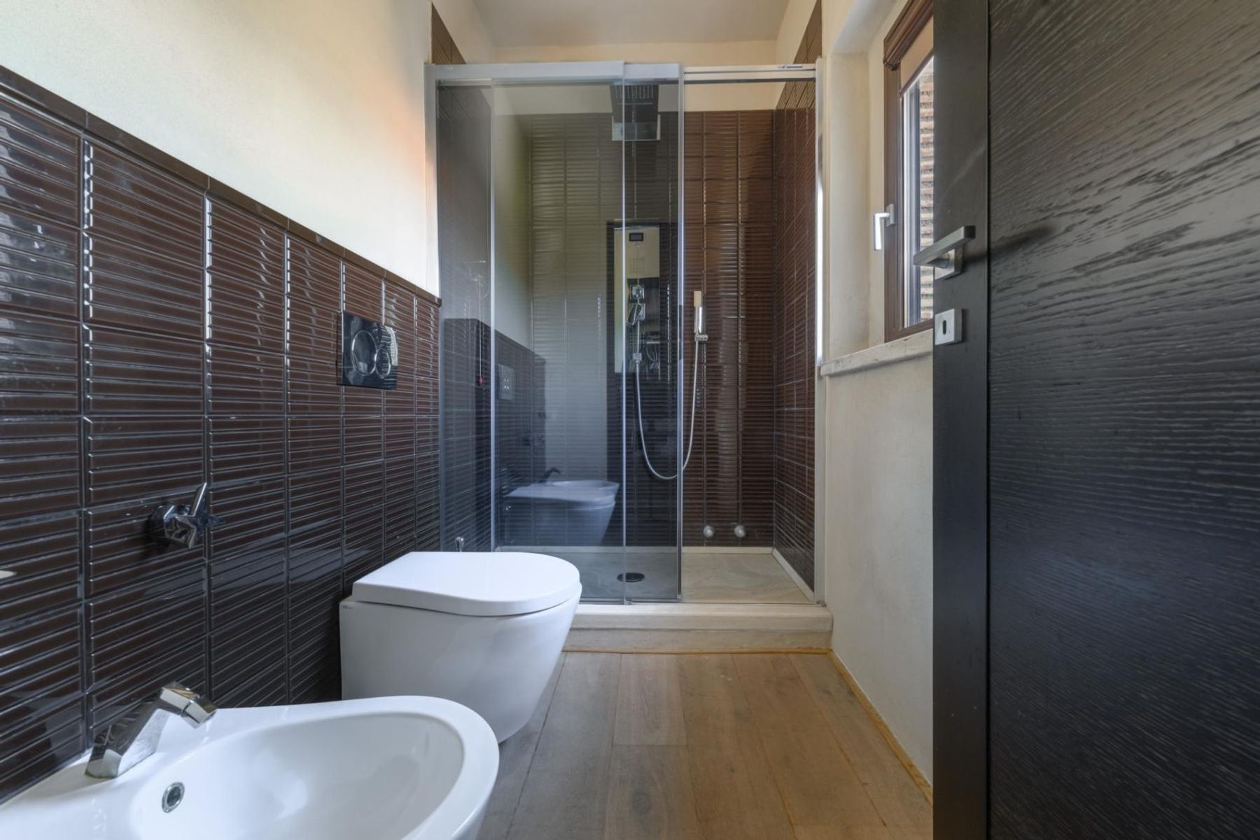 Modern ensuite bathroom with walk-in shower. 