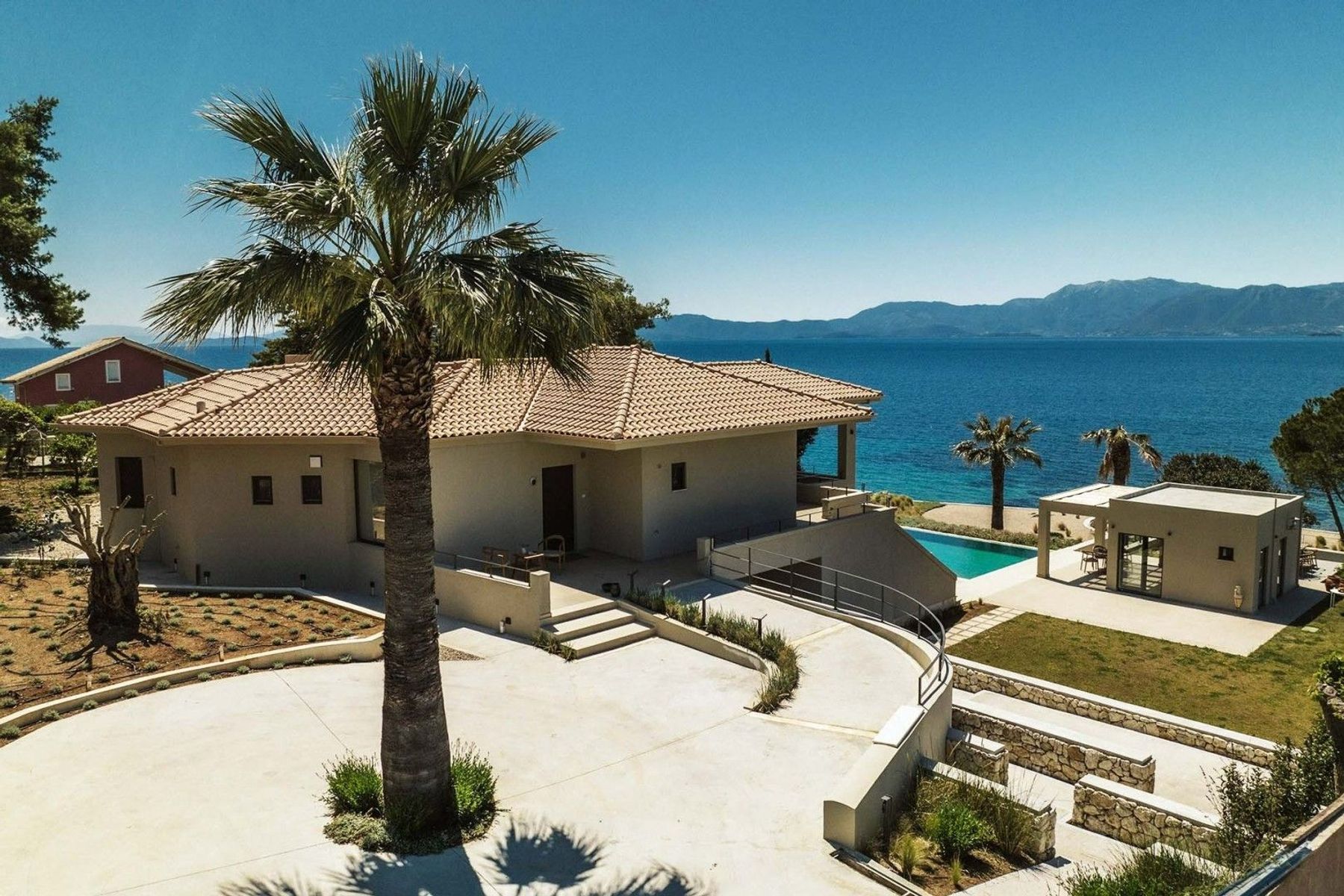A luxurious serene retreat just steps away from the shore. Enjoy easy access to the Ionian sea’s tranquility and breathtaking views.