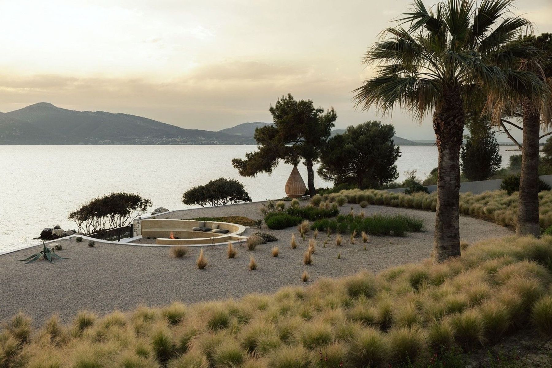 Watch the sunset from the spacious yard that lies in front of the sea, offering enchanting evenings by the coast.