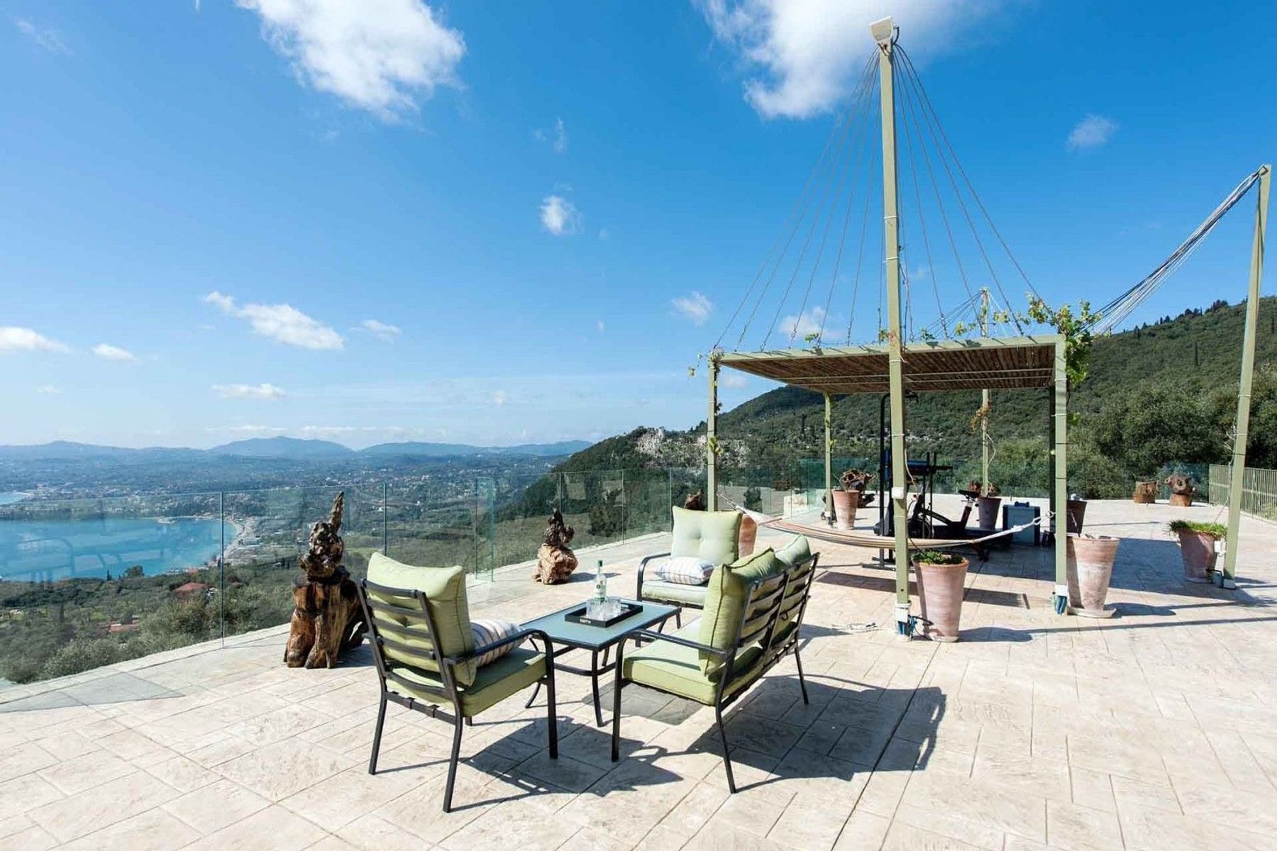 The upper-level terrace has plenty of space for a group meditation or a yoga session.


