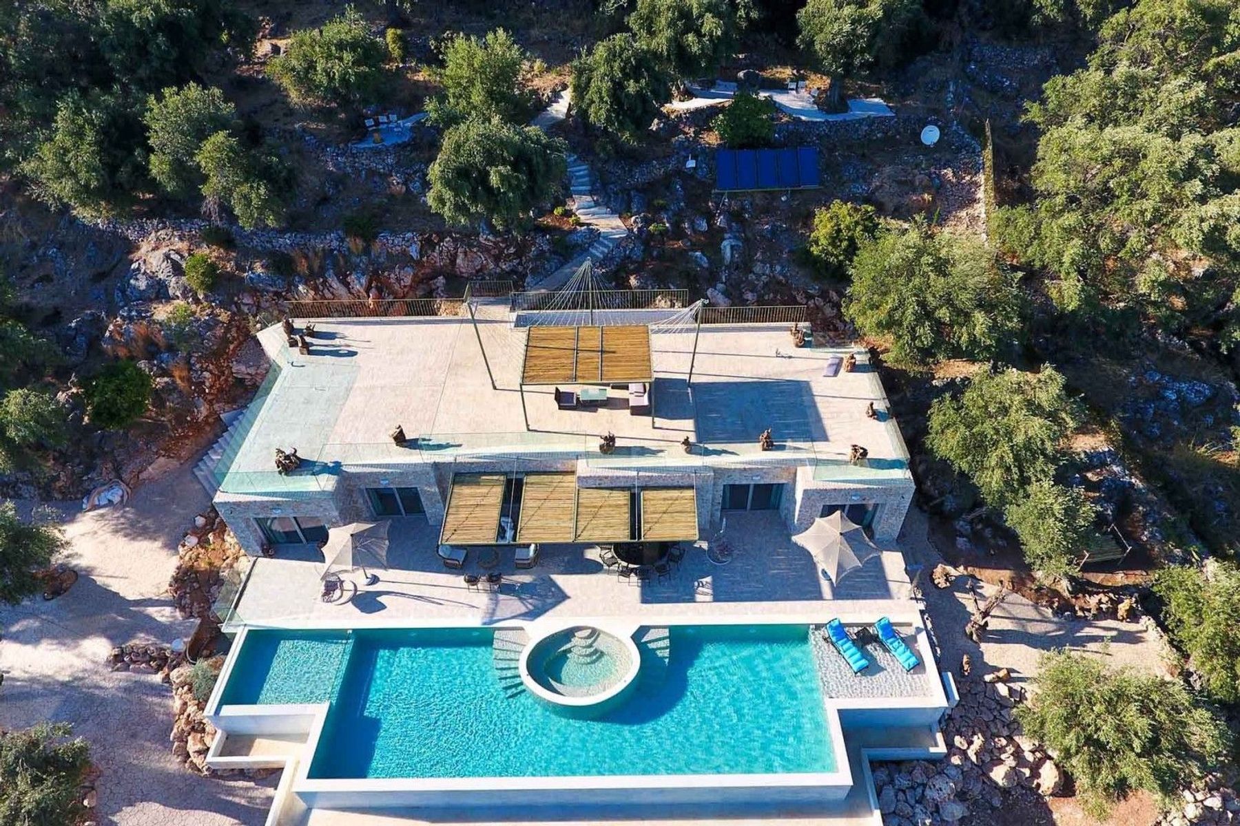 Gather your entire crew and head to this chic cliffside residence on the stunning island of Corfu. 