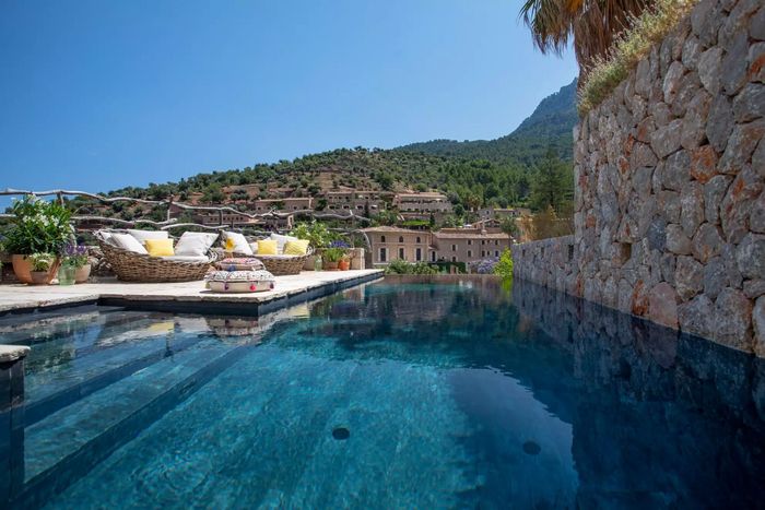 Private infinity swimming pool with incredible village views, and stunning terrace.