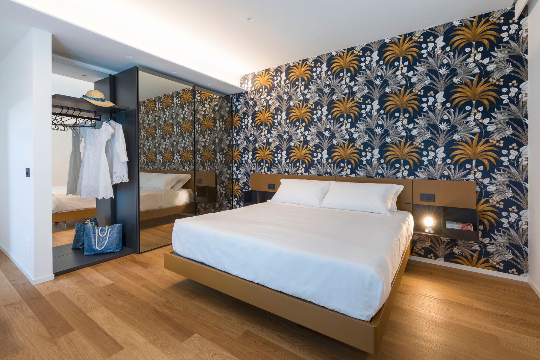 Double ensuite bedroom with modern furnishings and interiors.