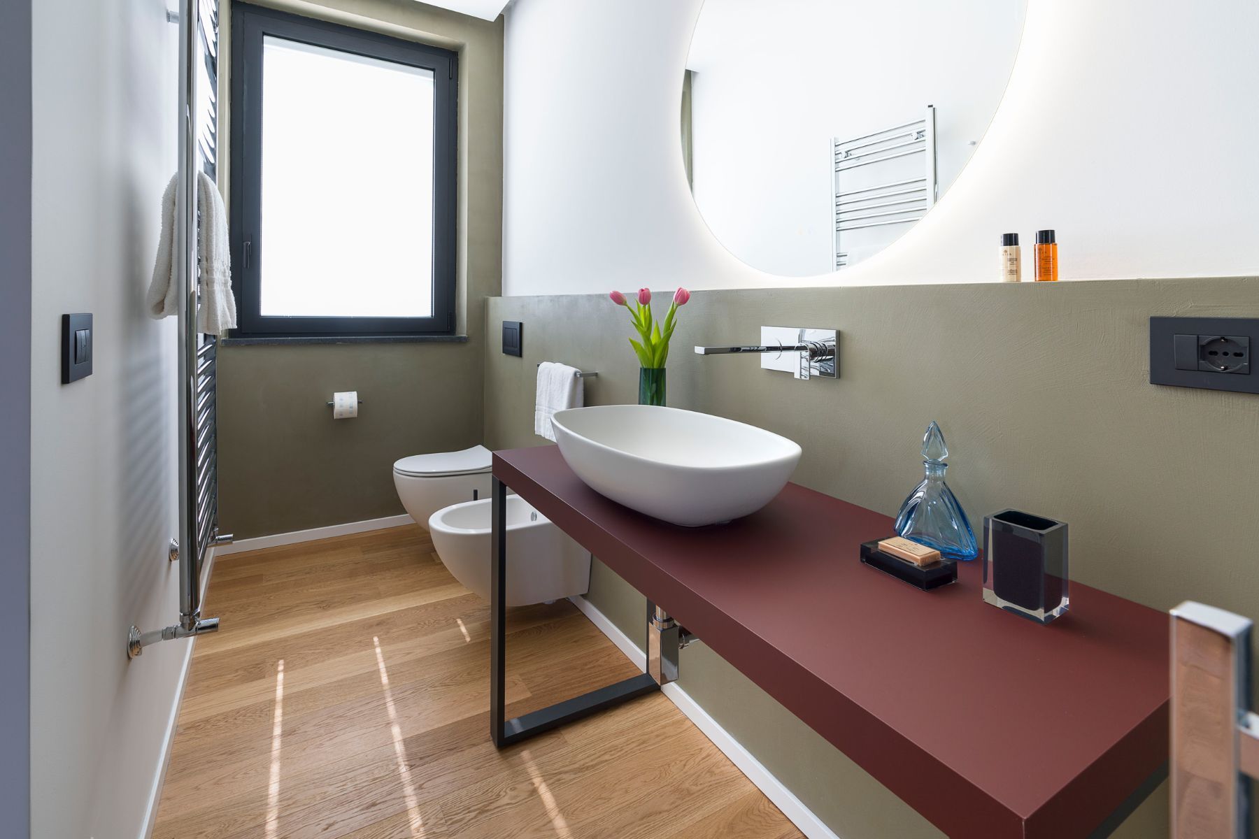 Bright and modern bathroom with contemporary facilities.  
