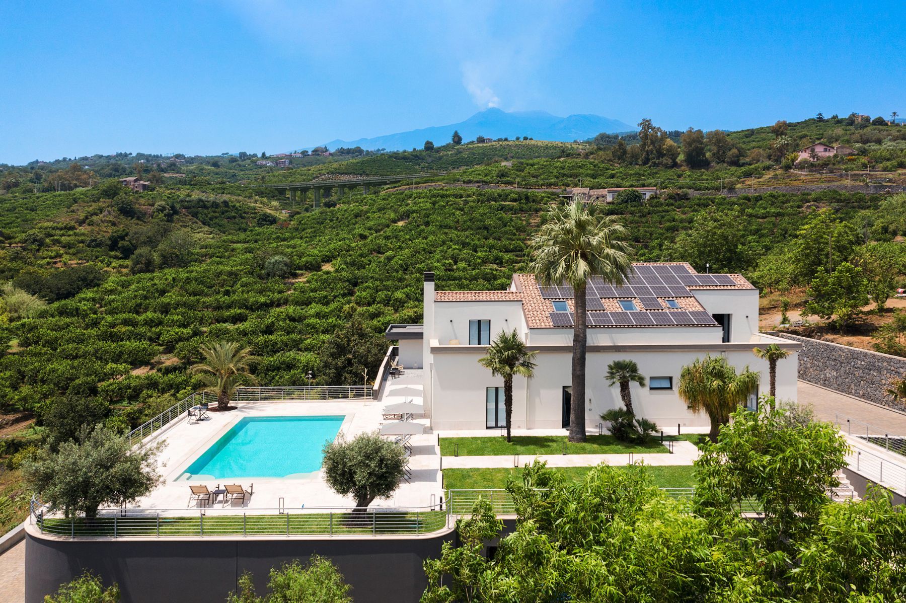 Perfect luxury villa for a relaxing vacation, surrounded by large terraces that offer enchanting countryside views.