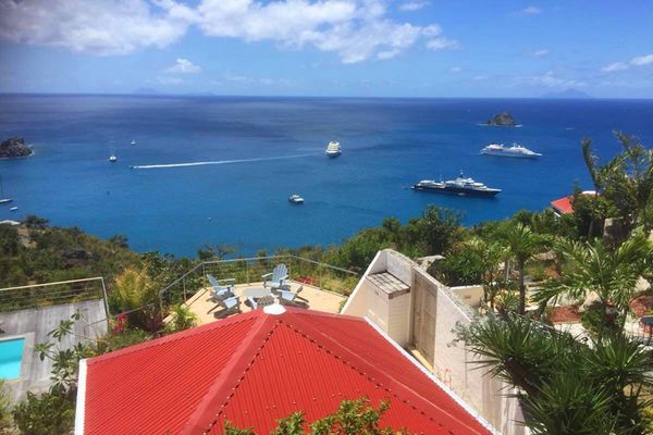 An aerial shot from above La Baleine Villa shows off views of Gustavia Harbor 