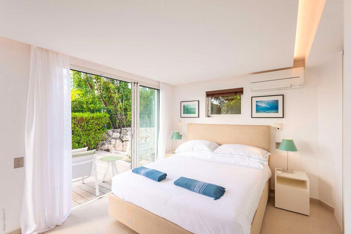 Bedroom four with garden patio access