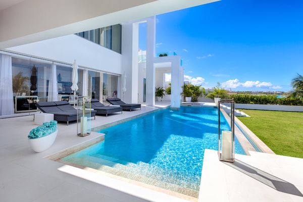 The Beach House features an amazing pool and outdoor area