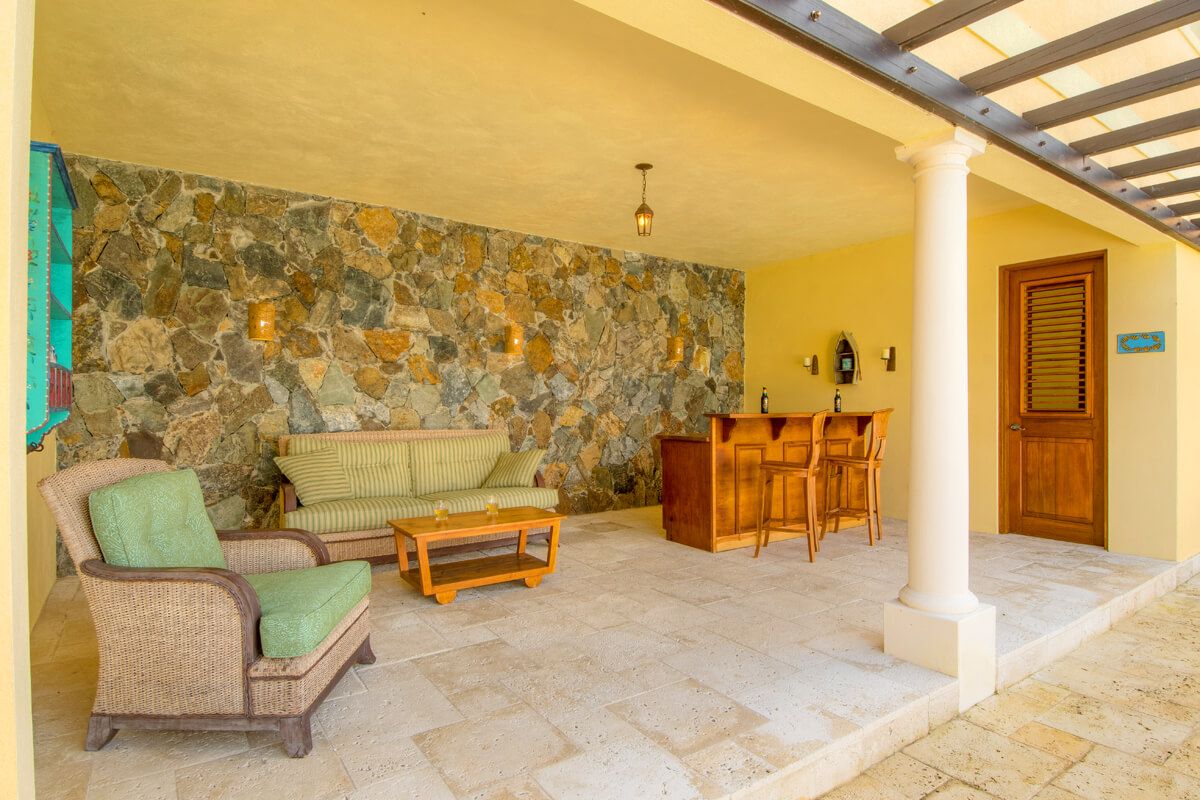 The outdoor bar and a sitting area