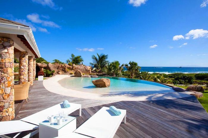 A beautiful beach entry pool at La Roche dans l’Eau