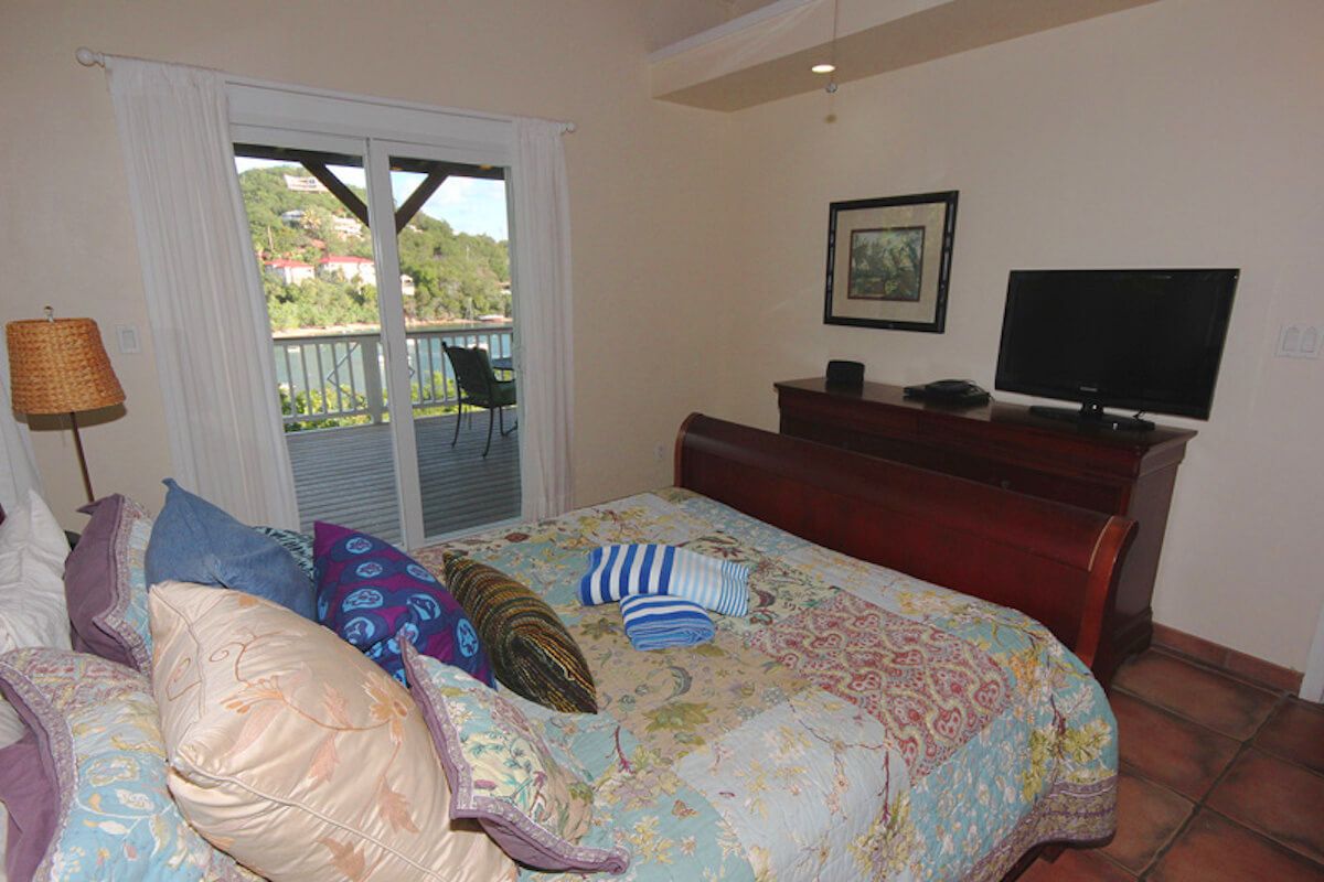 Queen - upper left bedroom with patio access