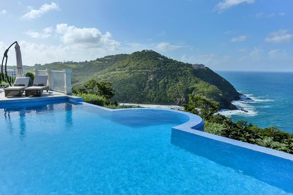 Cayman Villa is perched on a hillside at the northern tip of Cap Estate