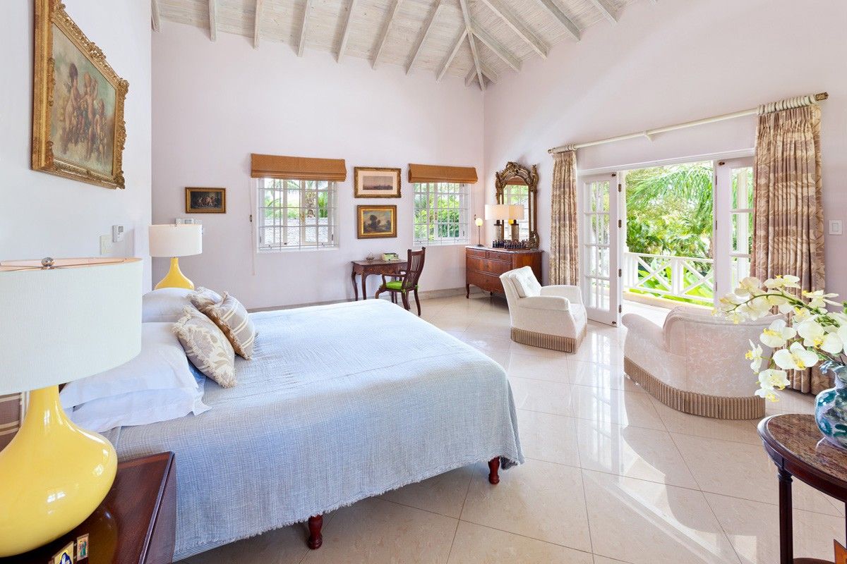 King bedroom with patio access