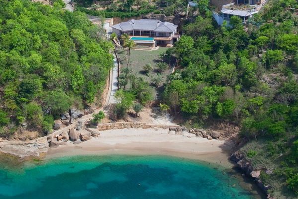 Aerial view of Galley Bay Heights Villa #104 and the beautiful beachfront