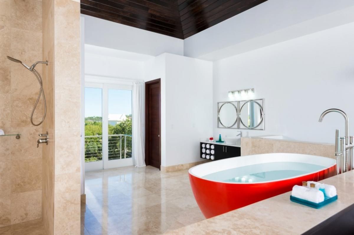 The bedroom is a combined en suite