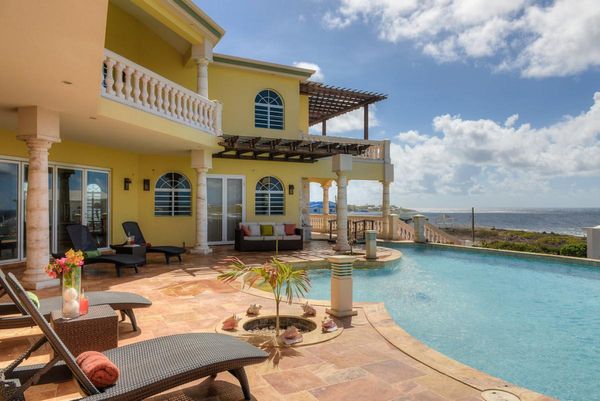 The beautiful entertainment patio and pool at Crystal Sunrise Villa