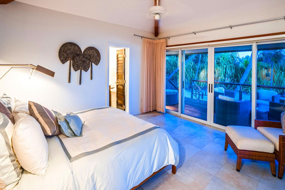 Another bedroom opens to a balcony