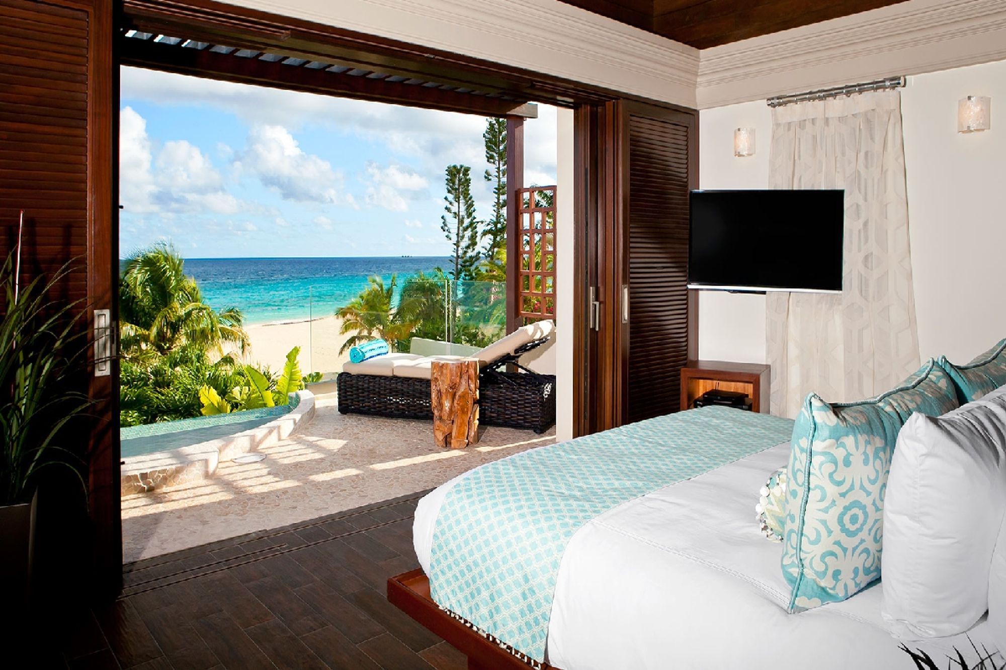 Master bedroom suite opens to a patio with a plunge pool