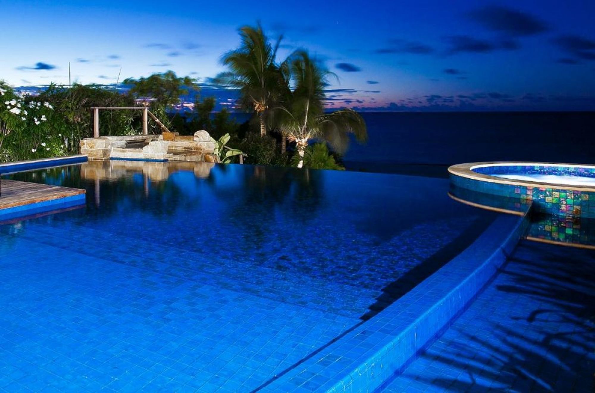 Night time views from the infinity edge portion of the pool