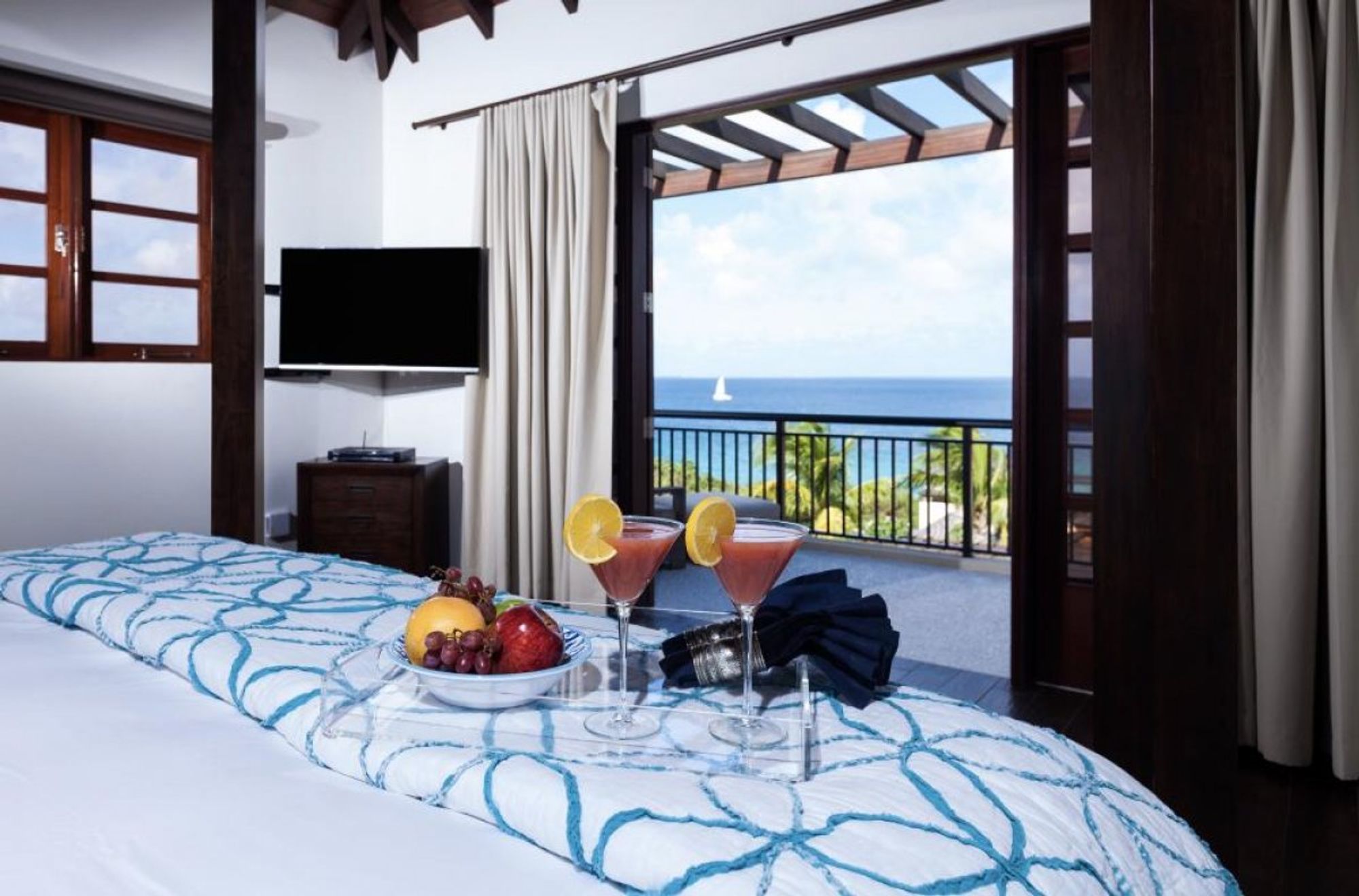 Upper level guest house bedroom with ocean views 