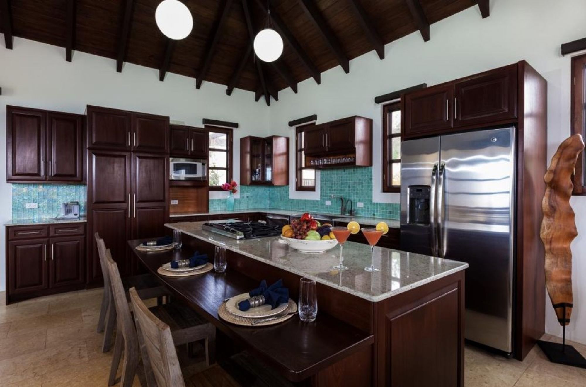 The guest house kitchen has a breakfast bar that seats three