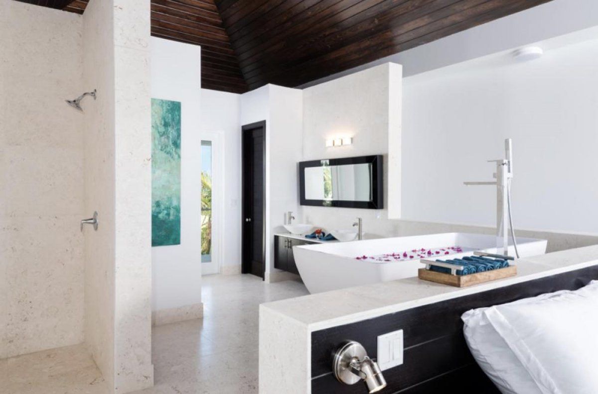 The bedroom has an in room en suite bath