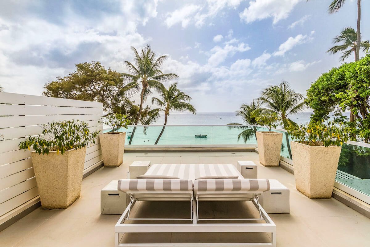 A sun bed on the private master balcony