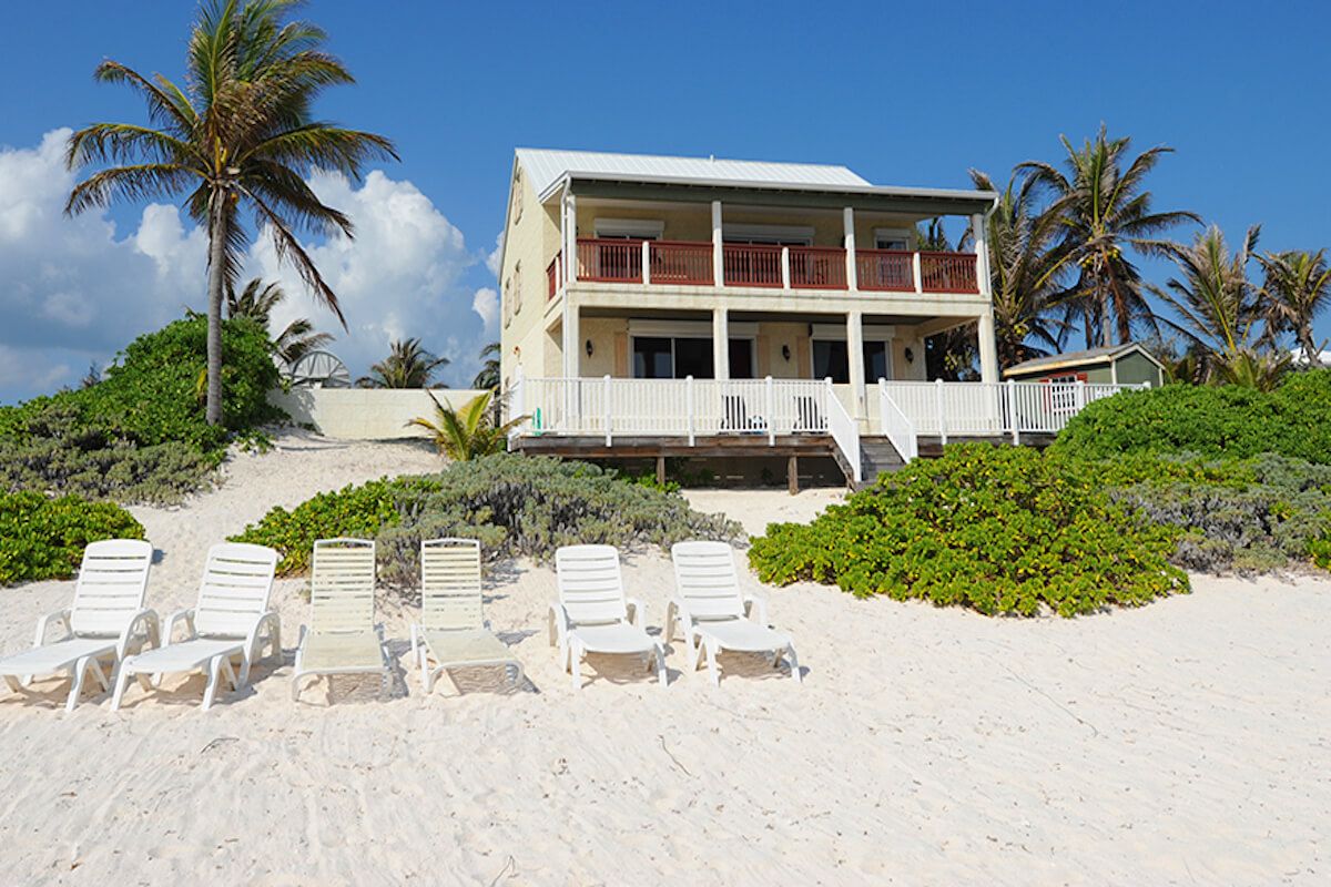 The white sandy beach in front of the villa