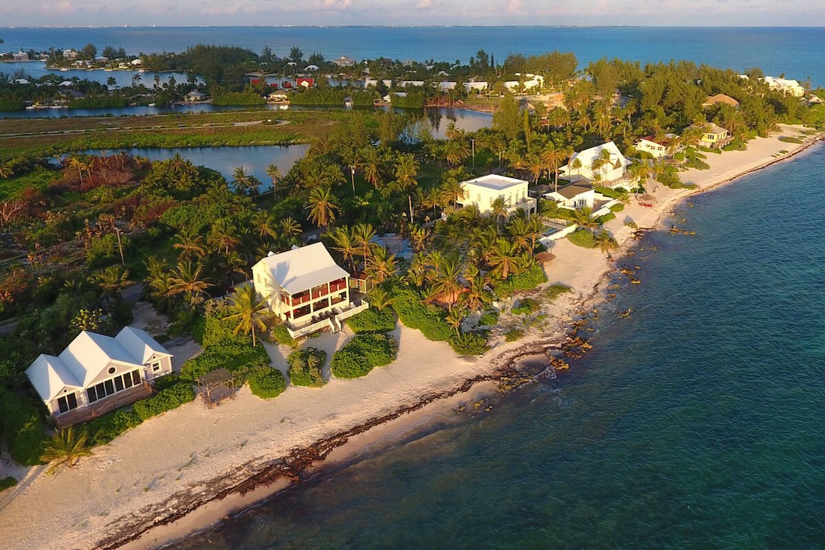 An aerial view of the villa and it's Rum Point location