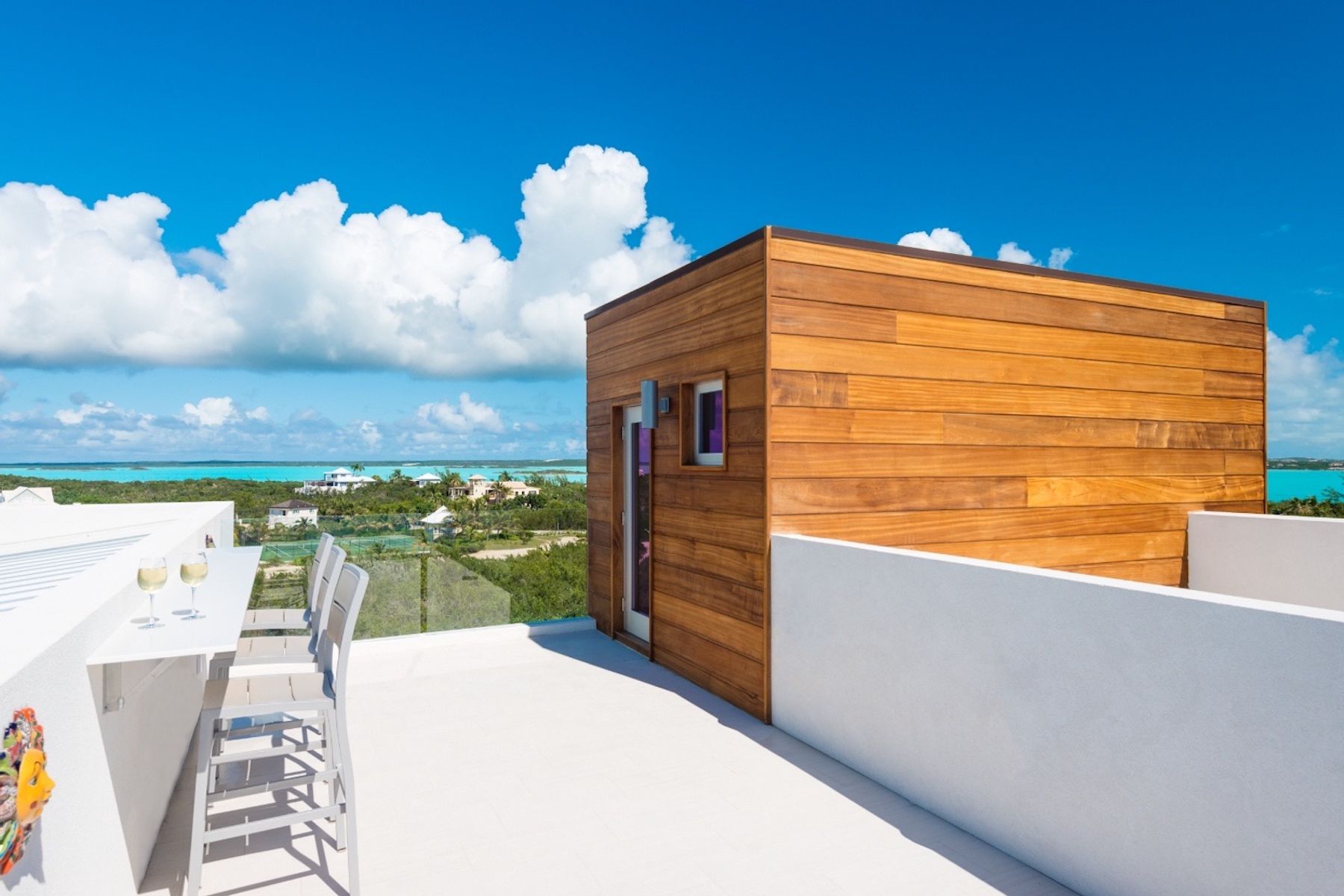 The rooftop patio has views of Taylor Bay