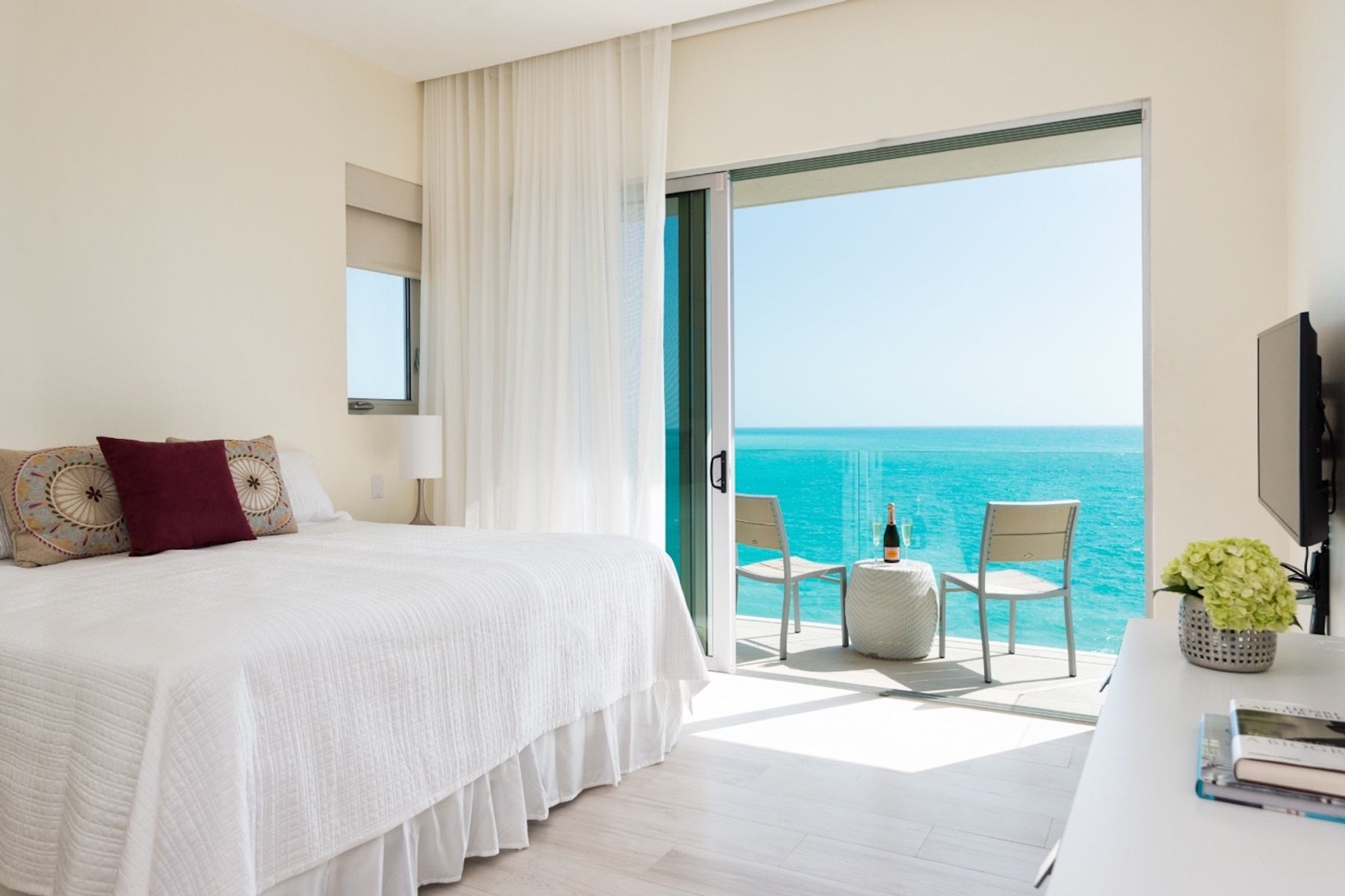 Sliding doors open to the patio in this bedroom
