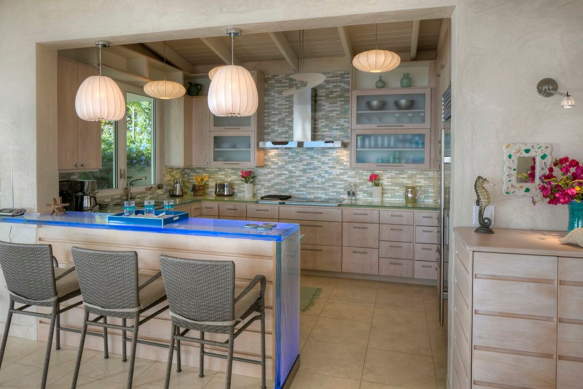 View of kitchen with Wolfe, Sub Zero & Miele appliances and living room