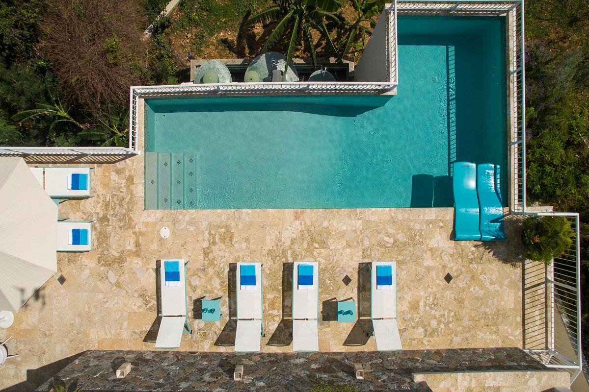 Loungers by pool